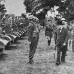 Winston Churchill inspects a unit of the Grenadier Guards equipped with Bren Gun Carriers. He spent much time travelling around every part of the country visiting all types of military unit.